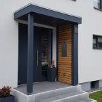 Eingangsüberdachung mit Wandverkleidung Flachdach